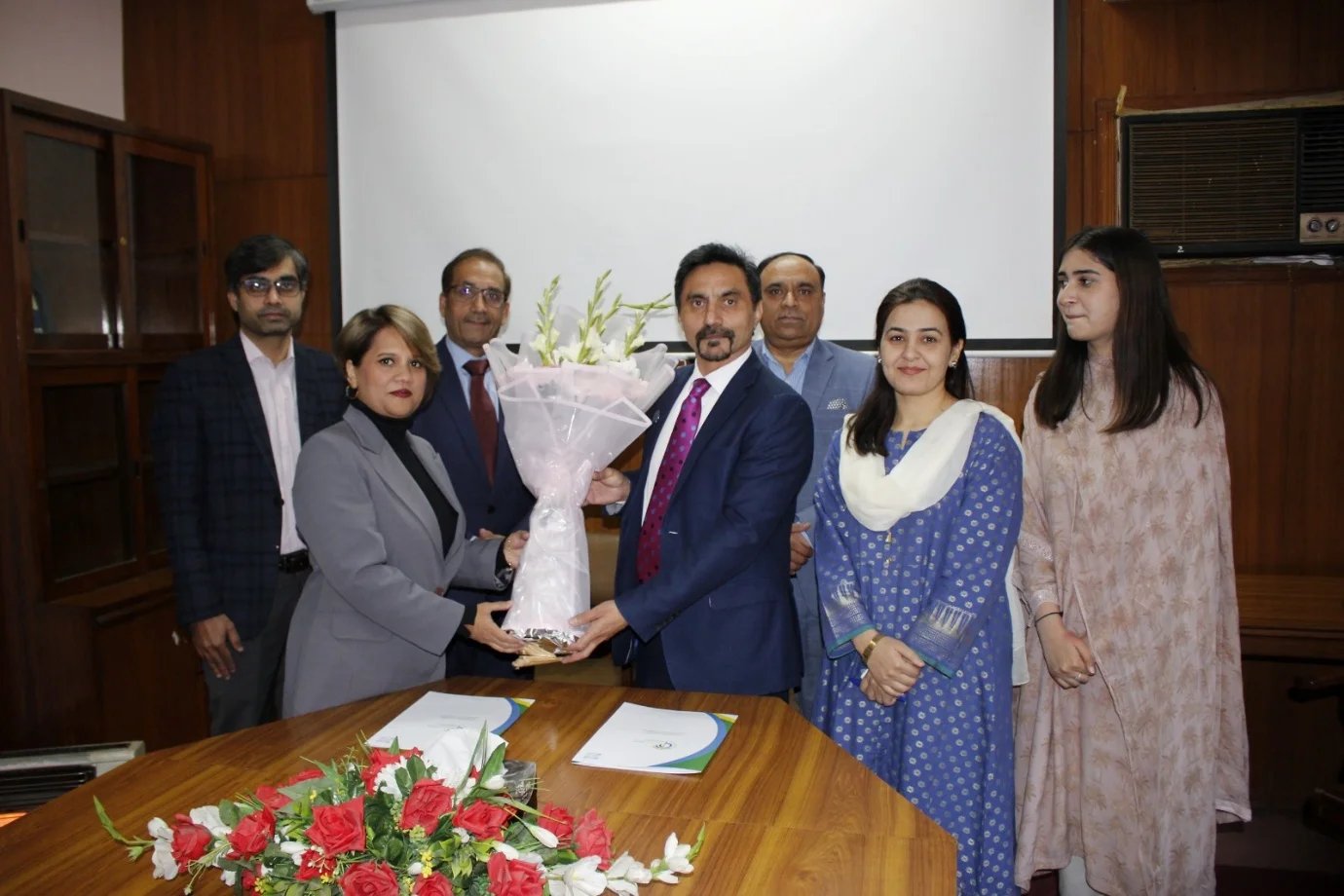 Group photo of PNCU and FGP representatives after MoU signing